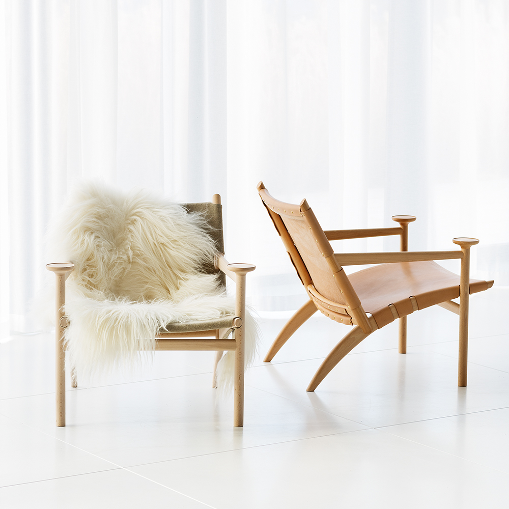 Hedwig David Ericsson Garsnas modern wood leather armchair swedish designer fur throw