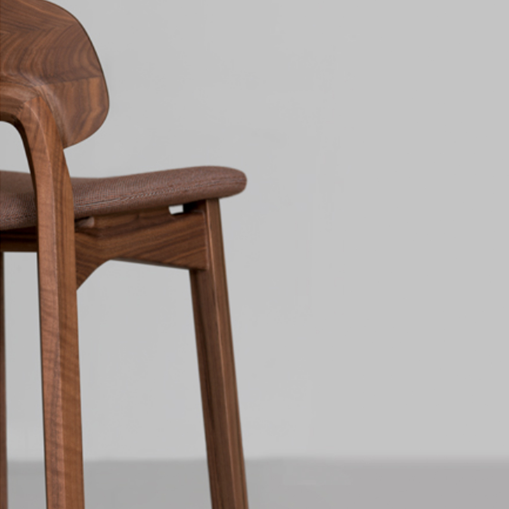 nonoto bar stool laufer keichel zeitraum suite ny walnut upholstered seat detail