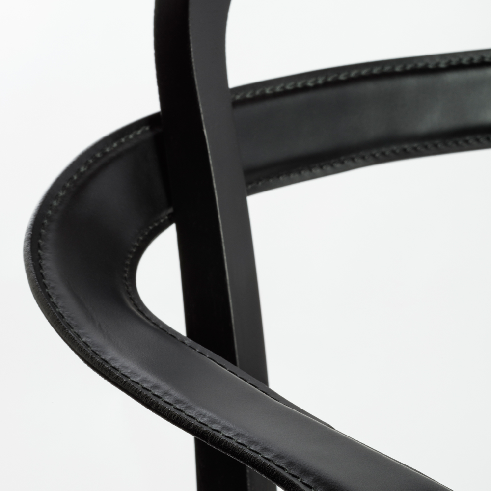 siro detail armchair black leather woodnotes suite ny